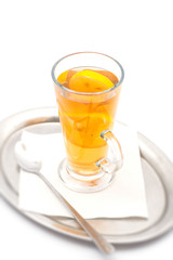 Hot citrus drink with alcohol, product photography for restaurant, winter hot drink