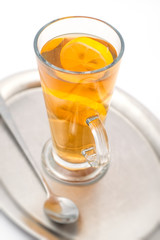 Hot citrus drink with alcohol, product photography for restaurant, winter hot drink