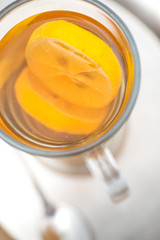 Hot citrus drink with alcohol, product photography for restaurant, winter hot drink