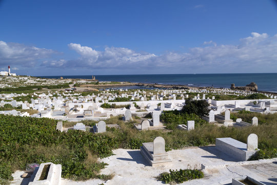 View from the coastal town of Mahdia in Mahdia Governorate of Tunisia, eastern Mediterranean coast with ruins of Fatimid Caliphate and graveyard.