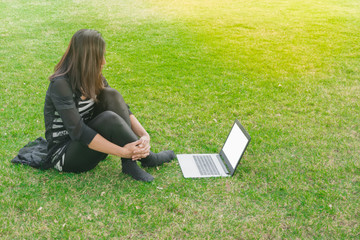 Beautiful asian woman working project analysis plans with generic design laptop. Smart work process concept.