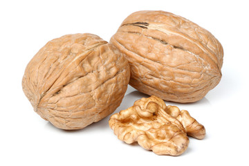 Whole walnut and half walnut piece.