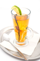 hot alcoholic drink with spice and fruit like lime and orange, winter drink, product photography for restaurant