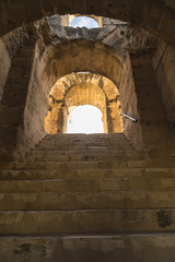 Obraz premium The Roman amphitheater of Thysdrus in El Djem (or El-Jem), a town in Mahdia governorate of Tunisia.The ancient structure has been a World Heritage Site since 1979.