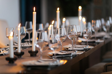 Wedding decor. interior. Festive . The burning candles on a table.