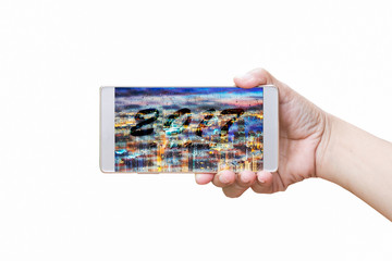 Men hand holding smartphone The screen is number 2017 with clipping path,Isolated on white background.