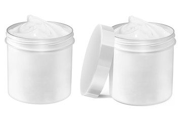 Set of two white cosmetic creme open jars with smudged creme on the outside and blank surface, one with lid and one without lid, beauty products isolated on white background, clipping path included