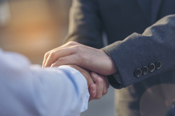 Trust Promise Concept. Honest Lawyer Partner with Professional Team make Law Business Agreement after Complete Deal. Ethics Business people handshake, touch and Respect customer to trust partnership. - obrazy, fototapety, plakaty
