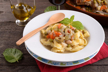 Cappelletti in turkey broth with herbs