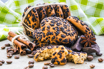 freshly baked chocolate chip cookies on rustic wooden table