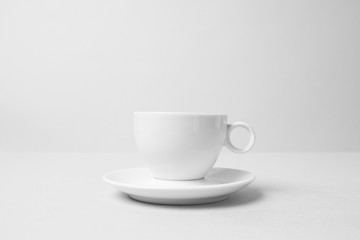 Obraz na płótnie Canvas Coffee cup on gray background