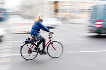 bicycle rider in motion blur