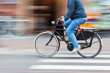 bicycle rider in motion blur