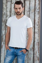 Man in white t-shirt and blue jeans