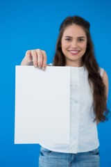 Woman holding a blank placard 