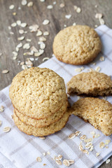 Homemade oatmeal cookies on checkered kitchen towel