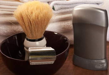 shaving tools on a wooden surface