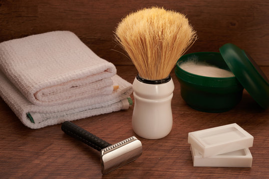 shaving tools on a wooden surface