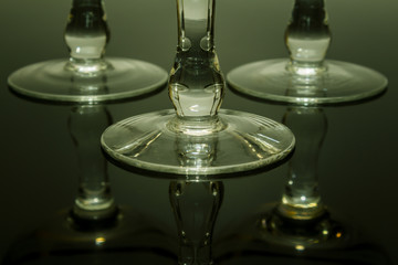 Glasses with white wine on blurred background