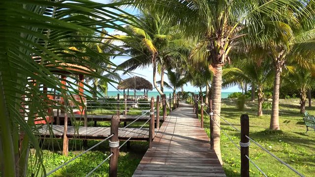 Types of the Cayo Levisa Island. Wooden walking deck to the beach.