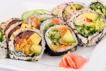 fresh various raw fish sushi plate closeup