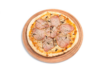 Big appetizing pizza on a wooden tablet