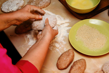 beef cutlets of meat in flour