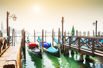 Fototapeta na wymiar Gondolas on Grand canal in Venice, Italy.