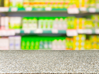 Blurred colorful supermarket products on shelves