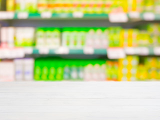 Blurred colorful supermarket products on shelves