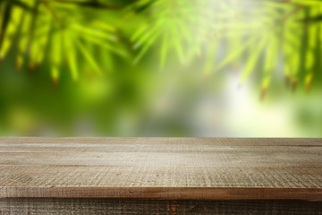 Wooden empty and blur bamboo background.
