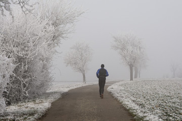 jogging in winter during fog