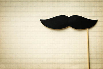 Fake black mustache.