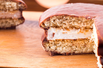 Macro view of the chocolate chip cookies with a layer of milk so