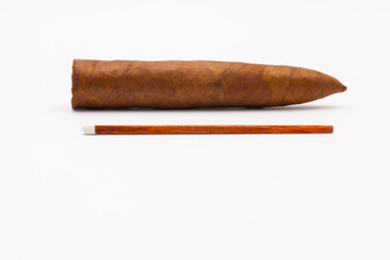 Luxury Cuban cigar and on the white desk
