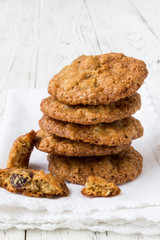Oat cookies on a white wooden table