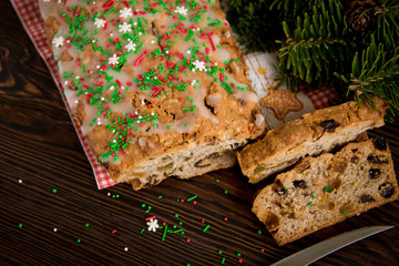 Winter delicious cake with candied fruit and decorations