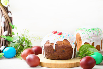 Easter cake  with sugar icing, decorated with painted eggs