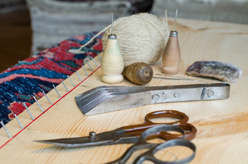 Rug restoration, knitting tools