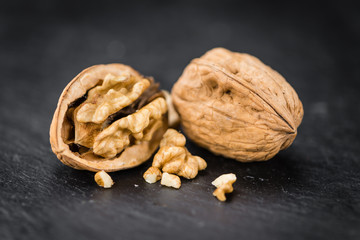 Portion of Whole Walnuts on a slate slab