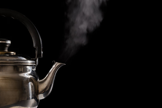 Tea Kettle With Steam Over A Hot Gas Stove Stock Photo - Download Image Now  - Kettle, Boiling, Steam - iStock