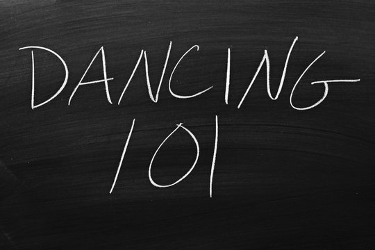 The words "Dancing 101" on a blackboard in chalk