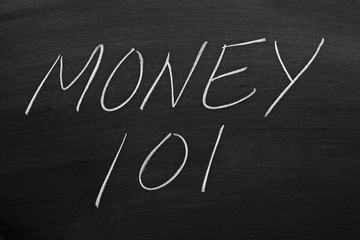 The words "Money 101" on a blackboard in chalk