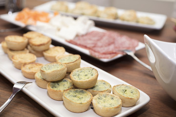 Mini Spinach and Cheese Quiche served as appetizers