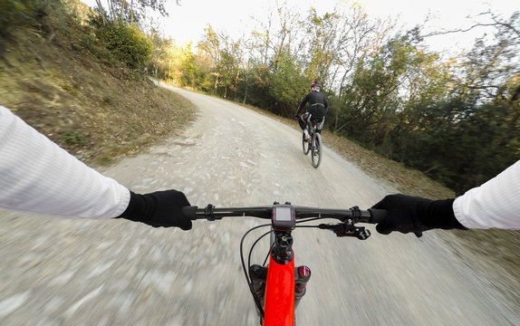 POV mountainbiking action: cycling riding on the Alps