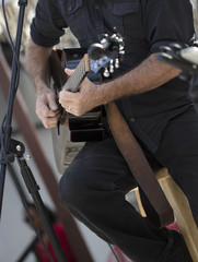 Music Duo Performing at an Outdoor Venue