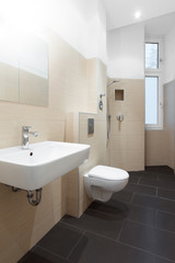 Fototapeta na wymiar modern bathroom - tiled modern shower room