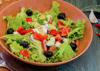 Fresh salad with vegetables and greens