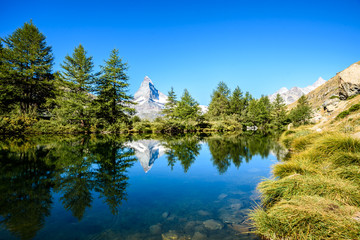 Fototapeta na wymiar Grindjisee - beautiful lake with reflection of Matterhorn at Zermatt, Switzerland