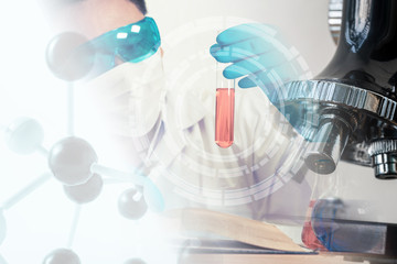 Double exposure of scientist,microscope and laboratory test tube